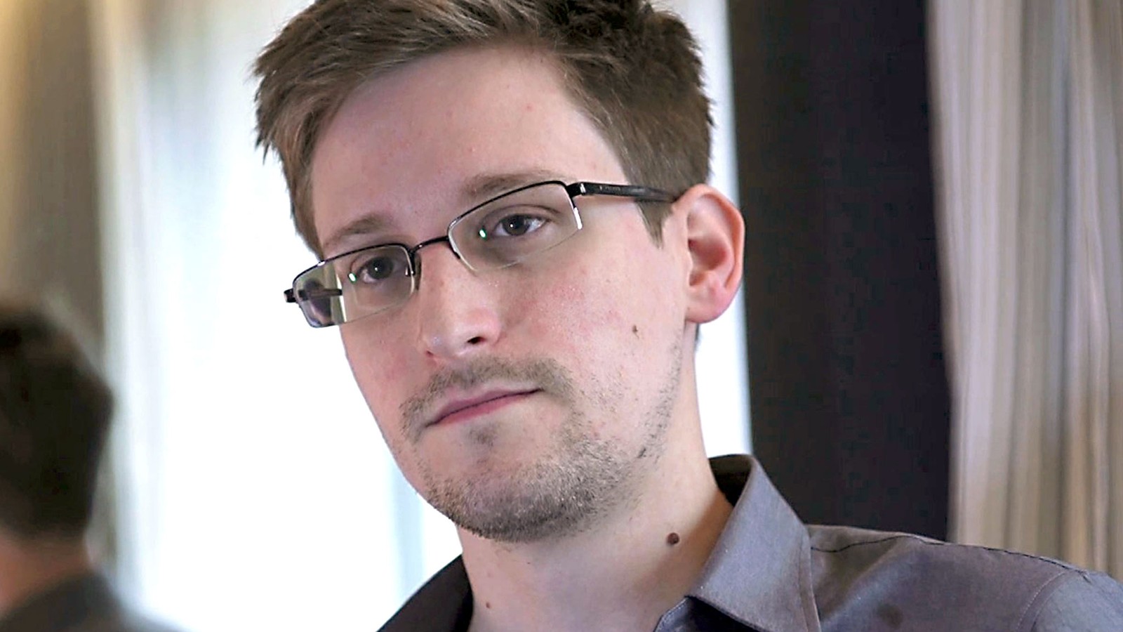 Former U.S. spy agency contractor Edward Snowden is interviewed by The Guardian in his hotel room in Hong Kong&#8230;Former U.S. spy agency contractor Edward Snowden is seen in this still image taken from video during an interview by The Guardian in his hotel room in Hong Kong June 6, 2013. Snowden was on July 24, 2013 granted documents that will allow him to leave a Moscow airport where he is holed up, an airport source said on Wednesday. The official, who spoke on condition of anonymity, said Snowden, who is wanted by the United States for leaking details of U.S. government intelligence programmes, was expected to meet his lawyer at Sheremetyevo airport later on Wednesday after lodging a request for temporary asylum in Russia. The immigration authorities declined immediate comment. Picture taken June 6, 2013. MANDATORY CREDIT. REUTERS/Glenn Greenwald/Laura Poitras/Courtesy of The Guardian/Handout via Reuters  (CHINA &#8211; Tags: POLITICS MEDIA)
ATTENTION EDITORS &#8211; THIS IMAGE WAS PROVIDED BY A THIRD PARTY. FOR EDITORIAL USE ONLY. NOT FOR SALE FOR MARKETING OR ADVERTISING CAMPAIGNS. NO SALES. NO ARCHIVES. THIS PICTURE IS DISTRIBUTED EXACTLY AS RECEIVED BY REUTERS, AS A SERVICE TO CLIENTS. NO THIRD PARTY SALES. NOT FOR USE BY REUTERS THIRD PARTY DISTRIBUTORS. MANDATORY CREDIT
